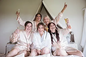 Bridesmaids on bed