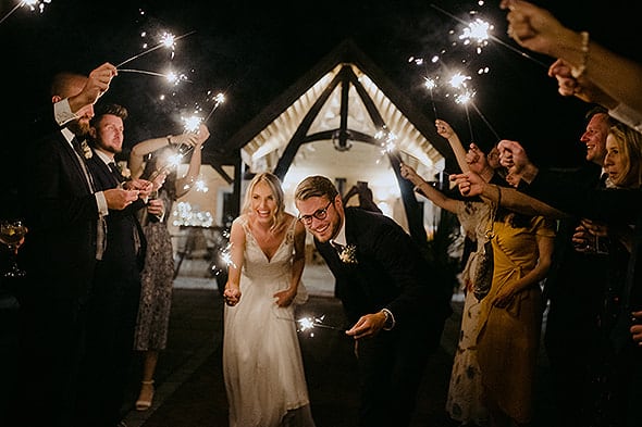 Happy couple under the arches