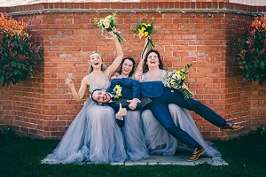 Bridesmaids and groom