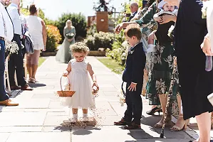 Ooops… bridesmaid drops confetti